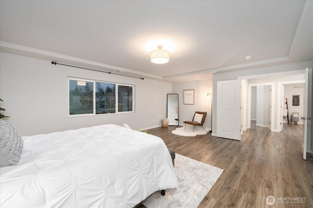 bedroom featuring wood-type flooring