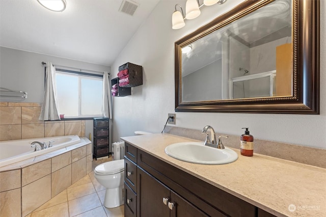 full bathroom featuring vaulted ceiling, tile patterned flooring, vanity, separate shower and tub, and toilet