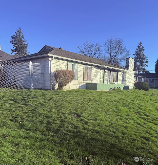 exterior space with a front lawn