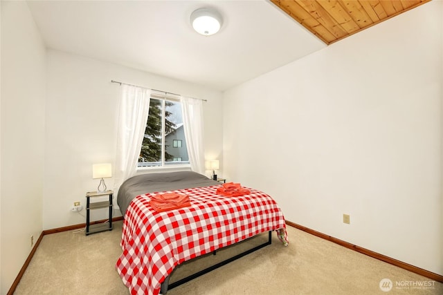 bedroom with light colored carpet