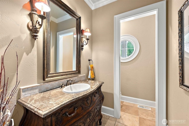 bathroom with vanity, visible vents, baseboards, ornamental molding, and tasteful backsplash