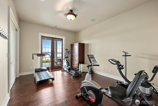 workout room with visible vents, french doors, baseboards, and wood-type flooring