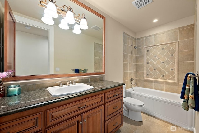 full bathroom with vanity, visible vents, tile patterned flooring, bathing tub / shower combination, and toilet