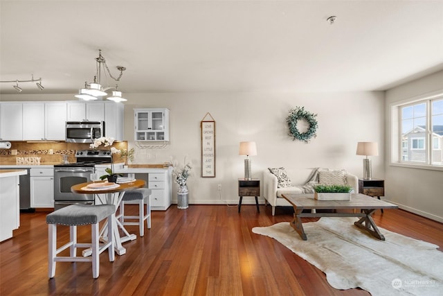 interior space with dark hardwood / wood-style flooring