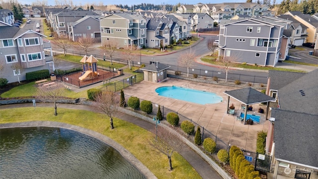 drone / aerial view with a water view