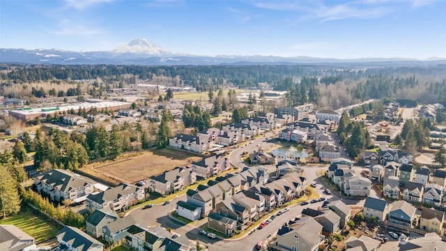 drone / aerial view featuring a mountain view