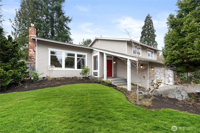 view of front of property with a front lawn