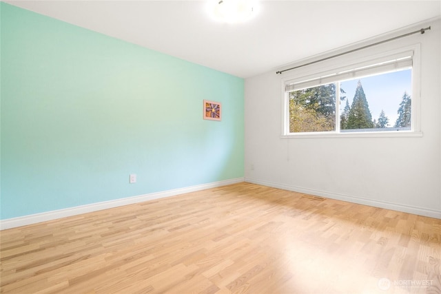 empty room featuring light hardwood / wood-style flooring