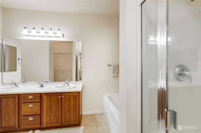 bathroom featuring vanity, tile patterned floors, and independent shower and bath