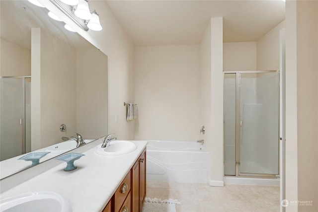 bathroom featuring vanity, separate shower and tub, and tile patterned floors