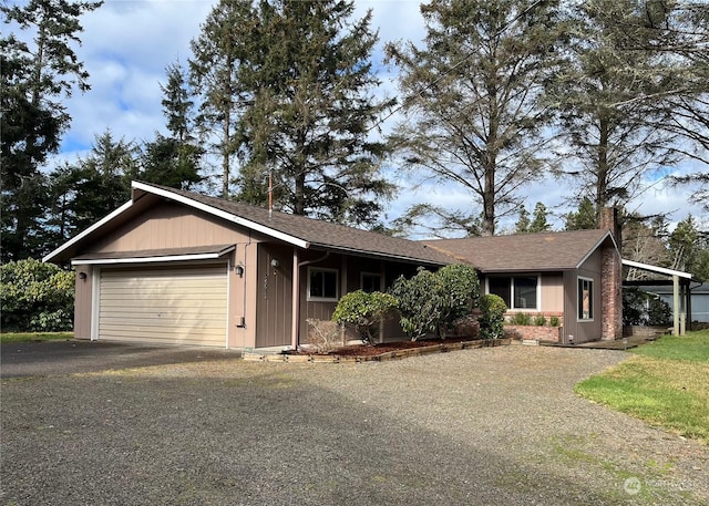 ranch-style home featuring a garage