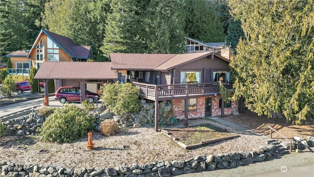 view of front of house with a wooden deck