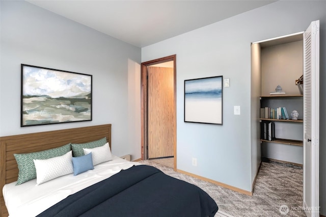 230 B St Unit 102, Friday Harbor, WA 98250 - bedroom with baseboards and carpet floors