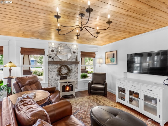 living room with a chandelier, wooden ceiling, ornamental molding, a fireplace, and hardwood / wood-style floors