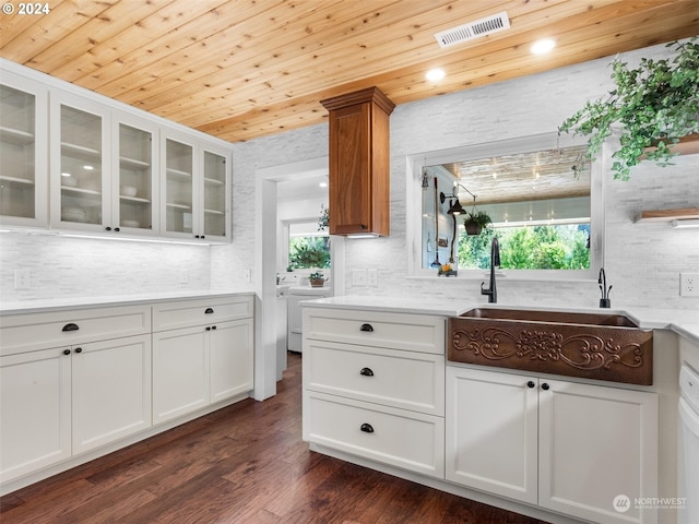 kitchen with white cabinetry, wood ceiling, and dark hardwood / wood-style flooring