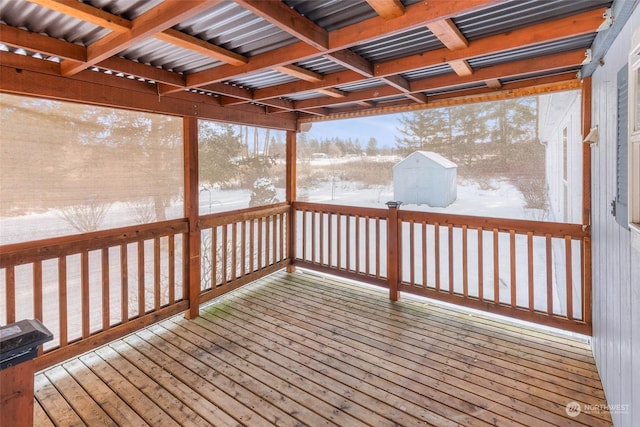 view of snow covered deck