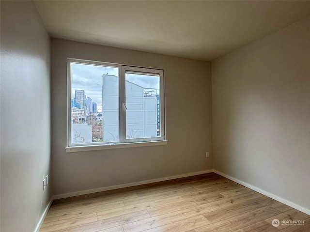 empty room featuring light hardwood / wood-style floors