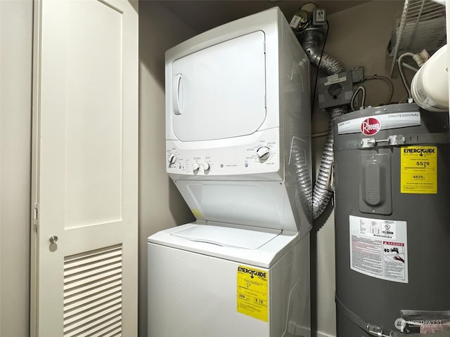 clothes washing area with stacked washer / drying machine and electric water heater