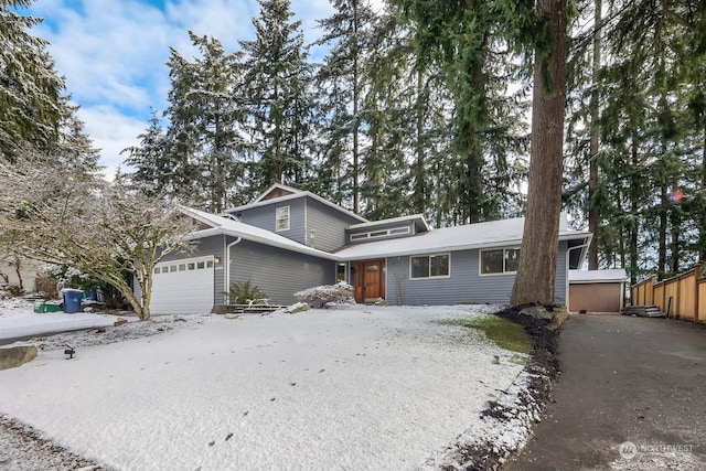 view of front of property with a garage