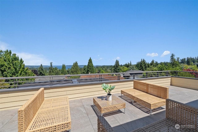 view of patio with a balcony