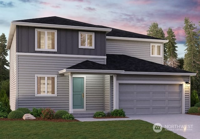 traditional-style home featuring a garage, concrete driveway, board and batten siding, and a front yard