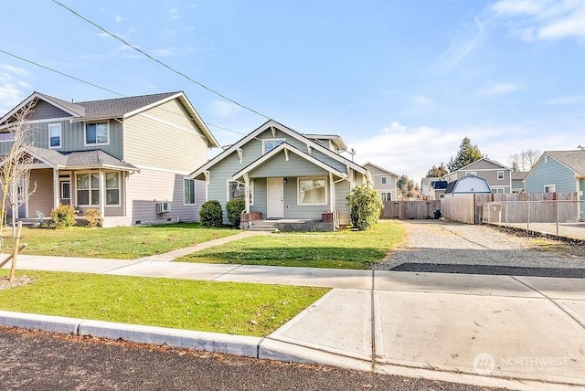 view of front of home featuring a front lawn