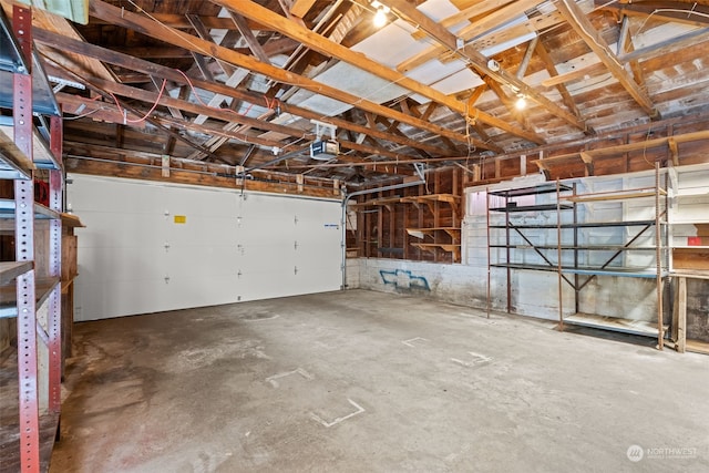 garage featuring a garage door opener