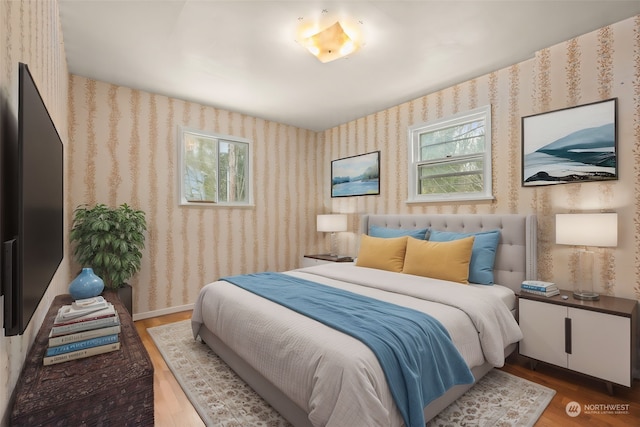 bedroom featuring wood-type flooring