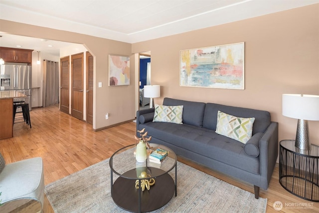 living room with light hardwood / wood-style floors