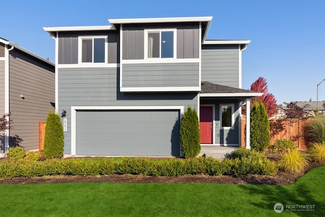 289 Wind River Ct, Chehalis, WA 98532 - view of front facade with a garage and a front yard