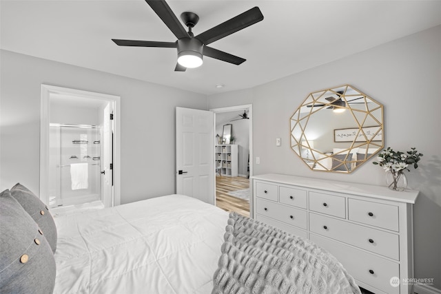 bedroom featuring ensuite bath, ceiling fan, and light wood-type flooring