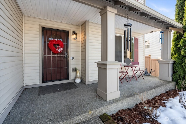 entrance to property with covered porch