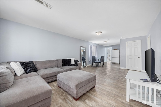 living room featuring hardwood / wood-style floors