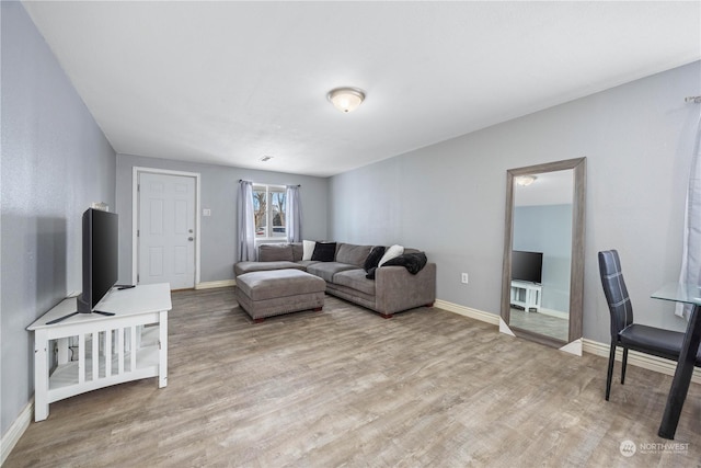 living room with hardwood / wood-style floors