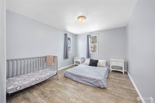 bedroom featuring hardwood / wood-style flooring