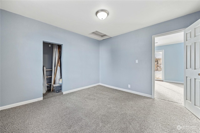 empty room with carpet flooring