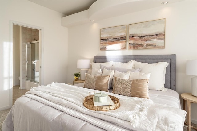 tiled bedroom with ensuite bathroom