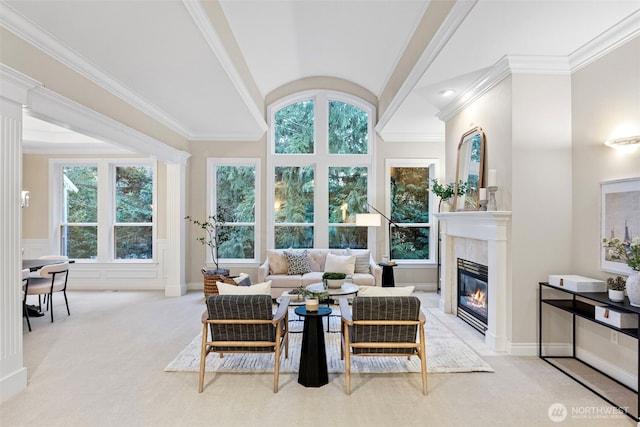 carpeted living room featuring crown molding, lofted ceiling, and a premium fireplace