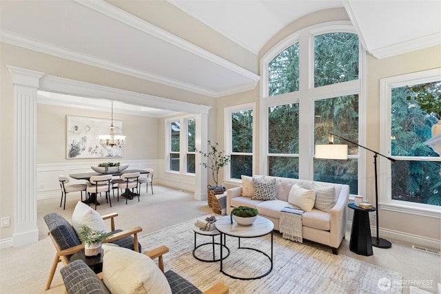 sunroom with an inviting chandelier