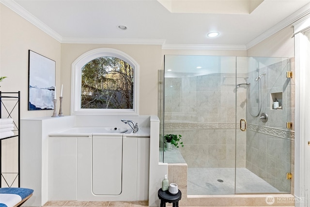 bathroom featuring crown molding and independent shower and bath