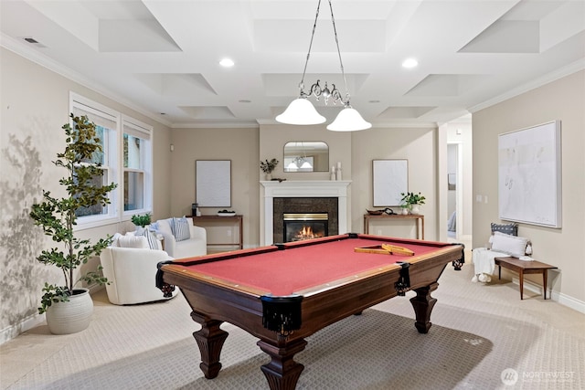 game room featuring coffered ceiling, ornamental molding, a high end fireplace, and light colored carpet