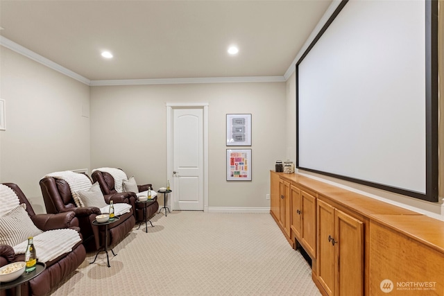 home theater room featuring crown molding and light colored carpet