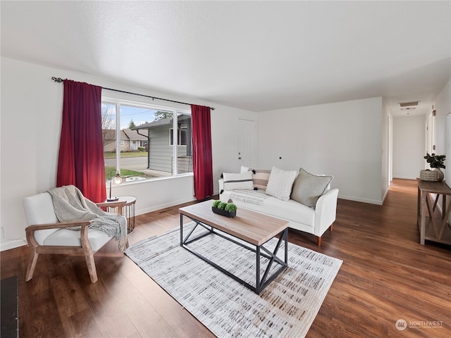 living room with dark wood-type flooring