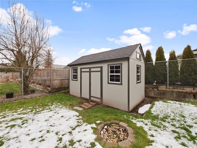 view of outbuilding featuring a lawn