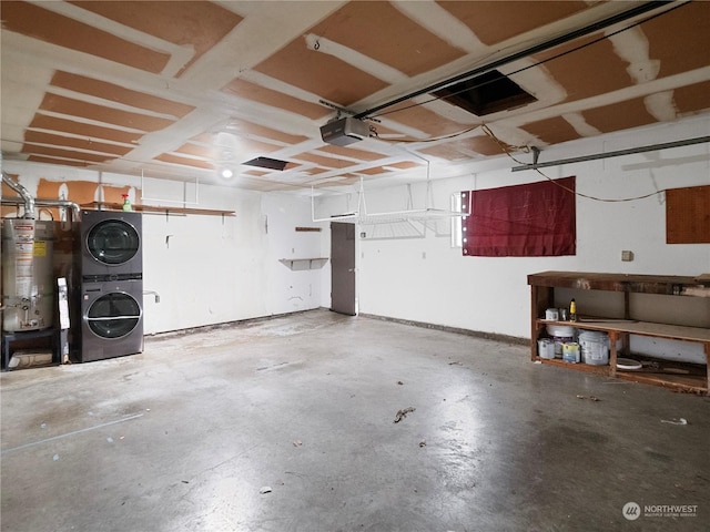 garage with water heater, stacked washer and clothes dryer, and a garage door opener