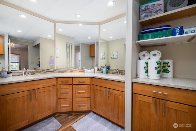 bathroom with vanity and hardwood / wood-style floors