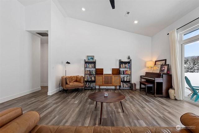 sitting room with hardwood / wood-style flooring