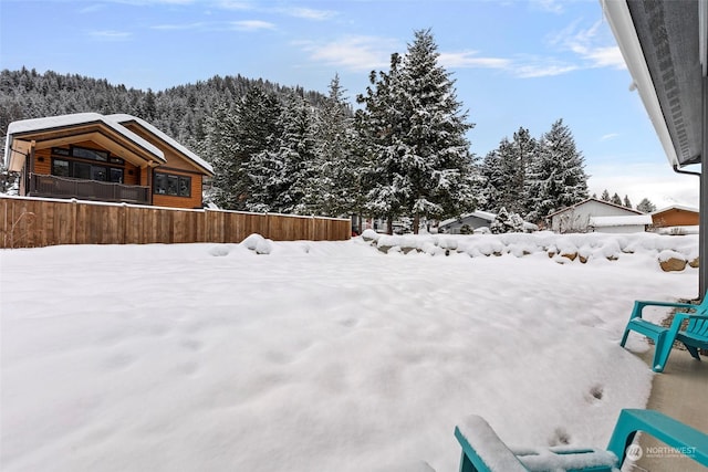 view of snowy yard