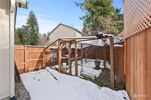 view of yard covered in snow