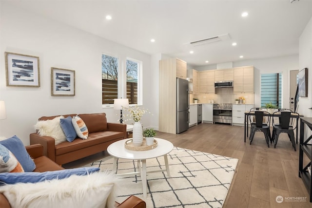 living room featuring light hardwood / wood-style floors